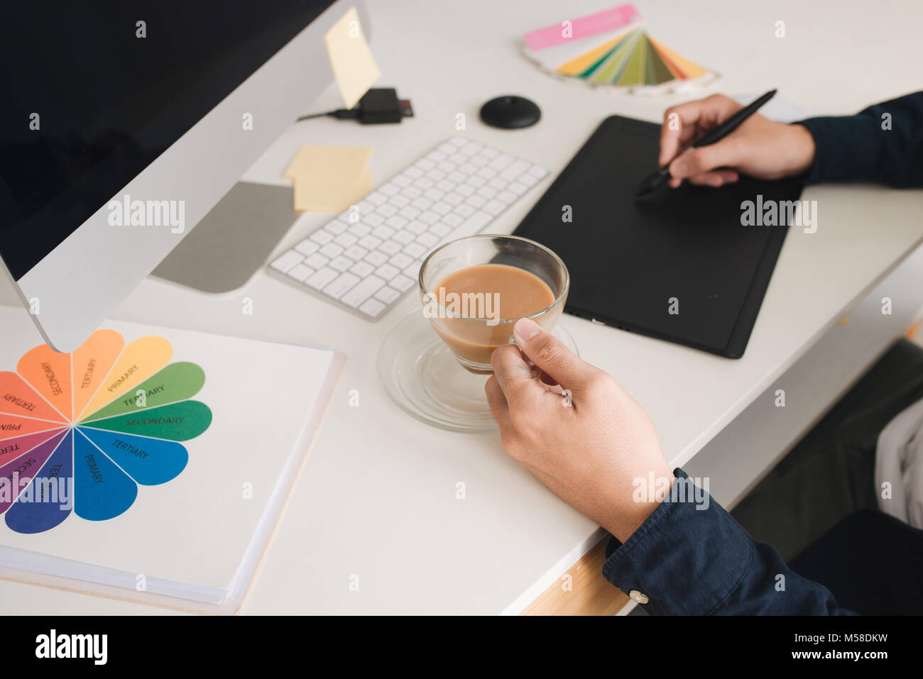 Fashion designer working tablet table hi-res stock photography and ...