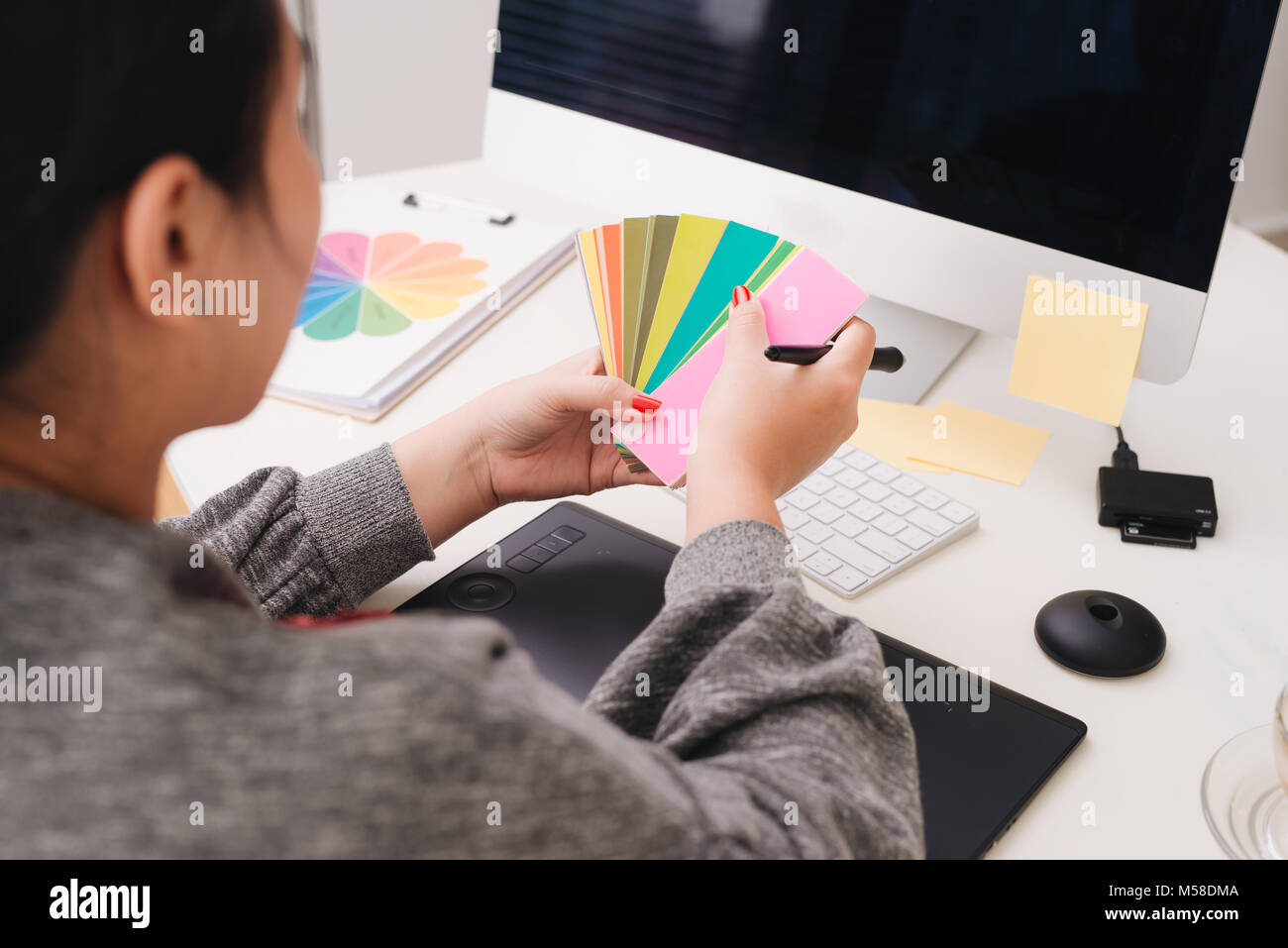 Interior designer hand working with new modern computer laptop and pro ...