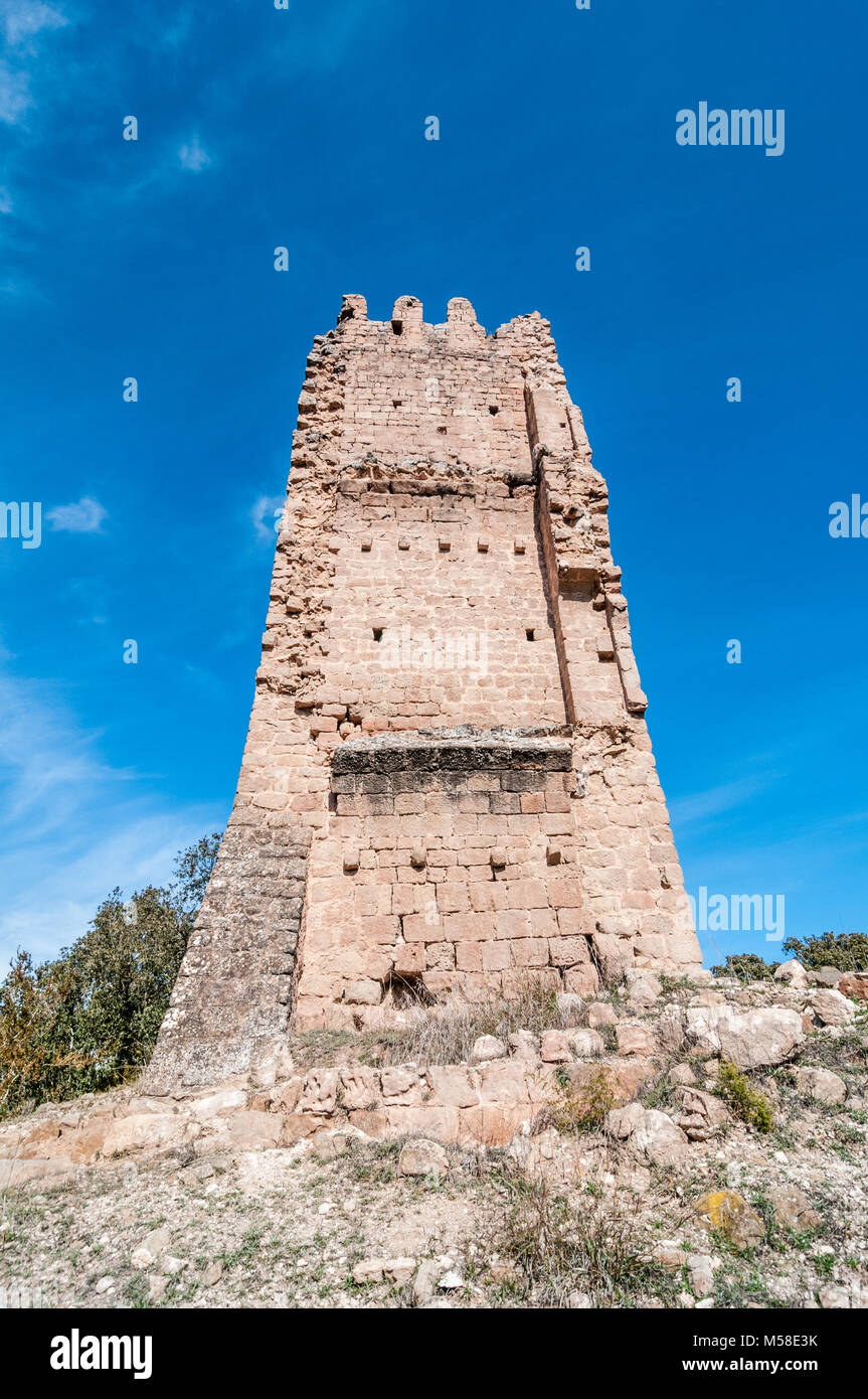 Merola castle. At the moment only the tramuntana wall of the homage tower is preserved. Collapsed half tower finished with battlements, merlons. Puig- Stock Photo