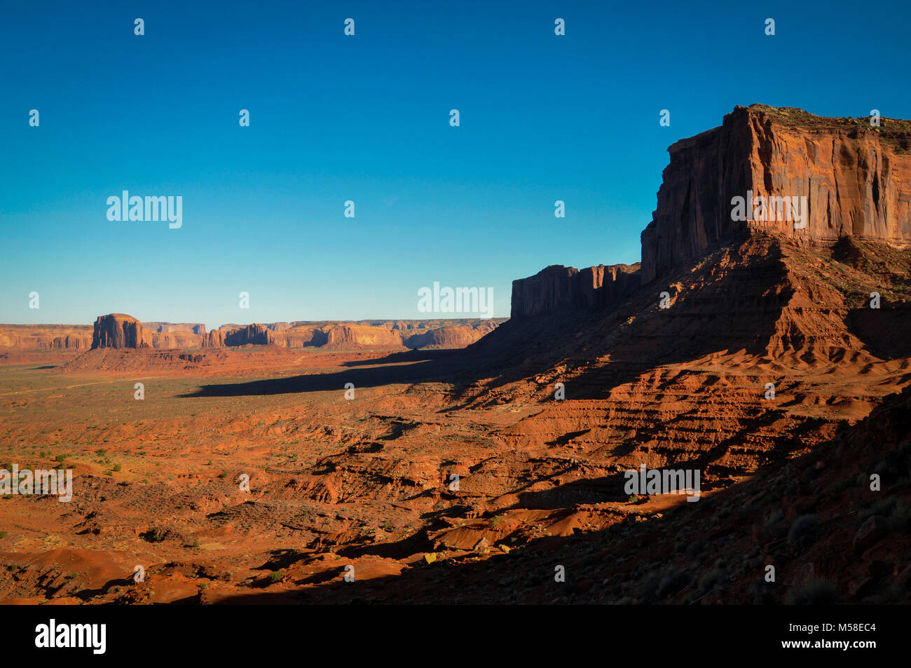Big rock at the edge of the Track of Monument Valley Stock Photo - Alamy