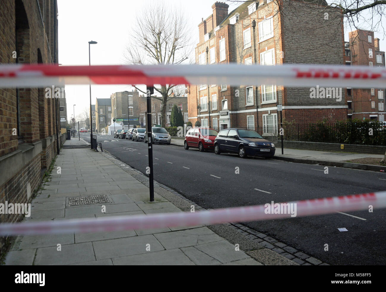 The scene on Bartholomew Road in Camden, London, after a young man was