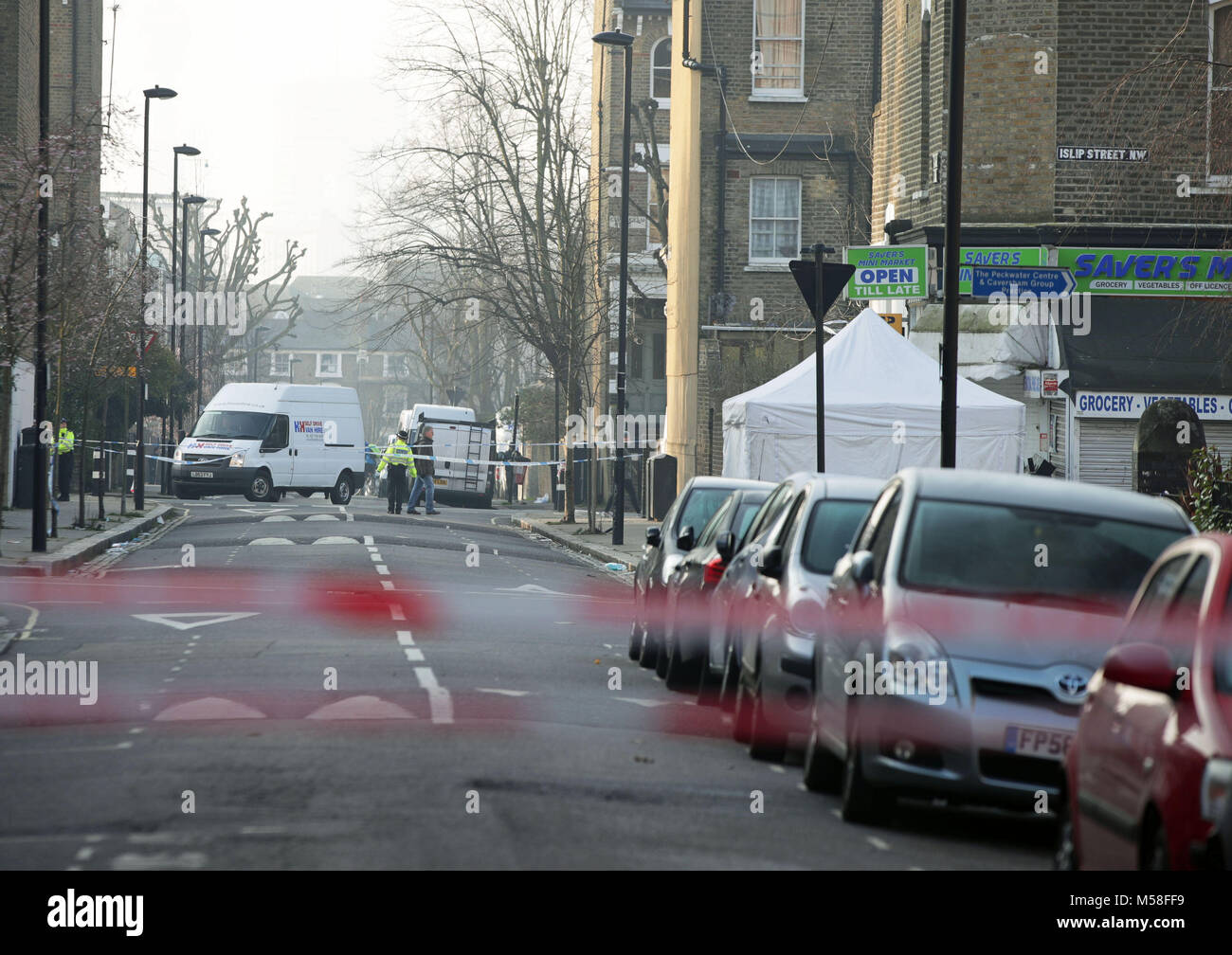 The scene on Bartholomew Road in Camden, London, after a young man was