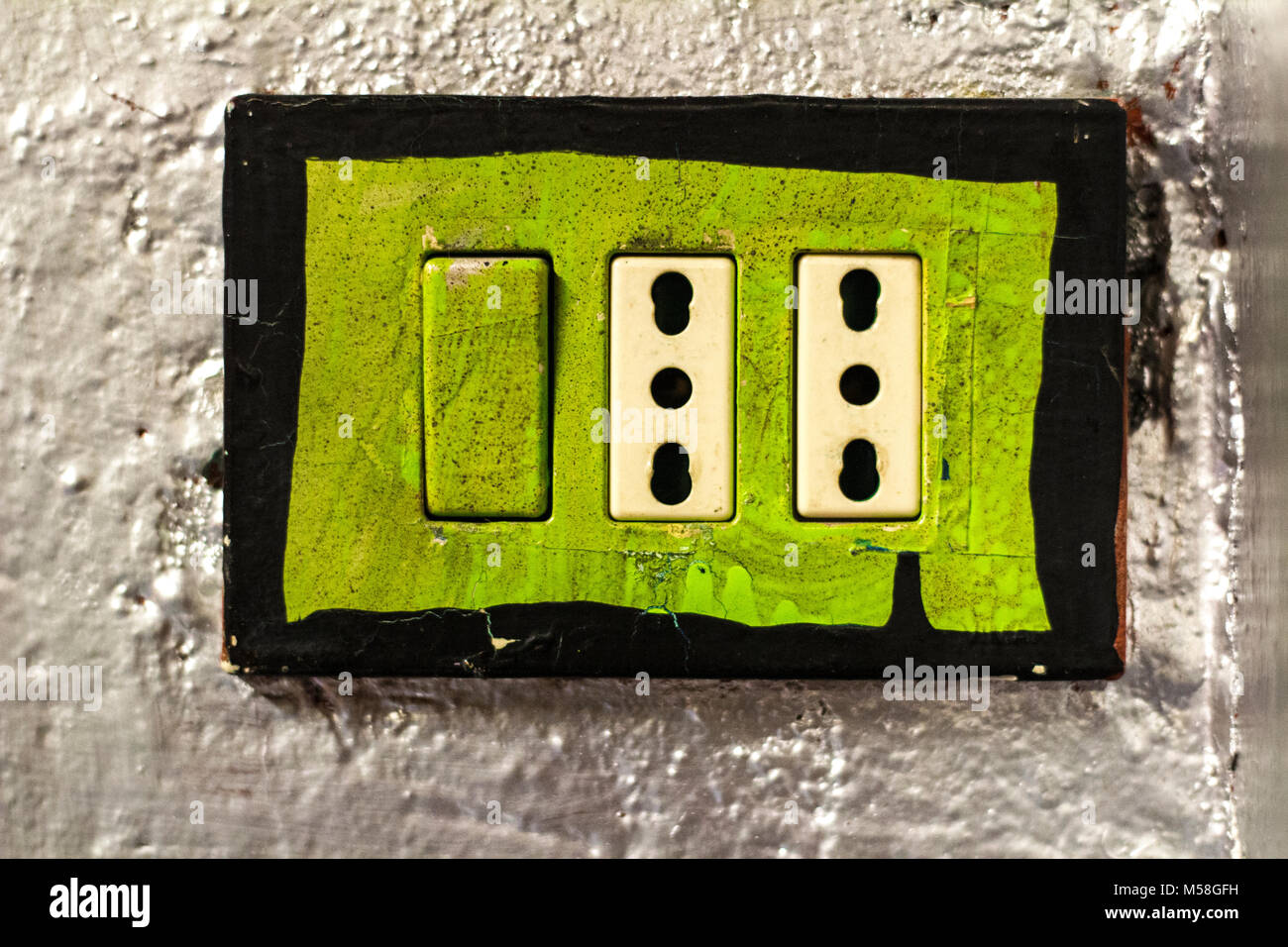 Colored Green power Outlet Stock Photo