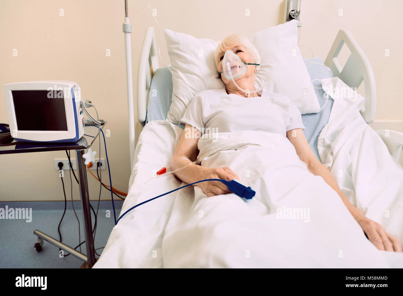 Old lady hospital bed hires stock photography and images Alamy
