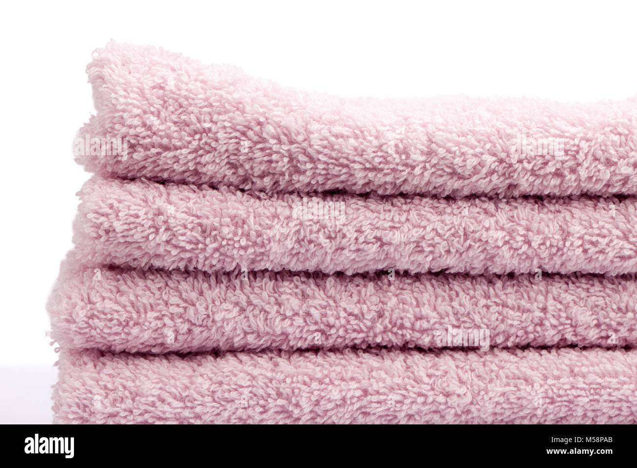 https://c8.alamy.com/comp/M58PAB/pile-of-fluffy-pink-towels-M58PAB.jpg