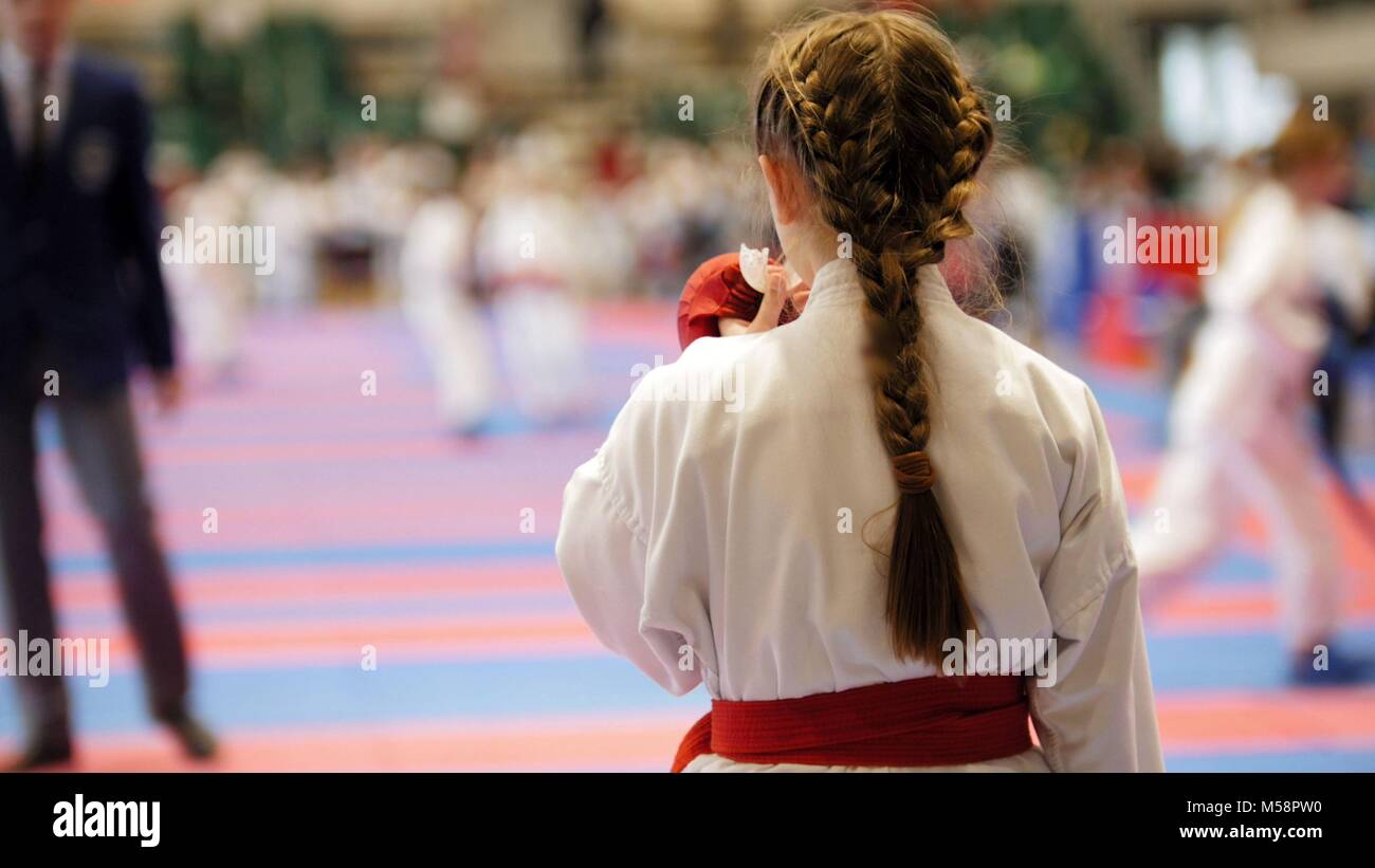 Young karate watching fighting other athletes Stock Photo Alamy