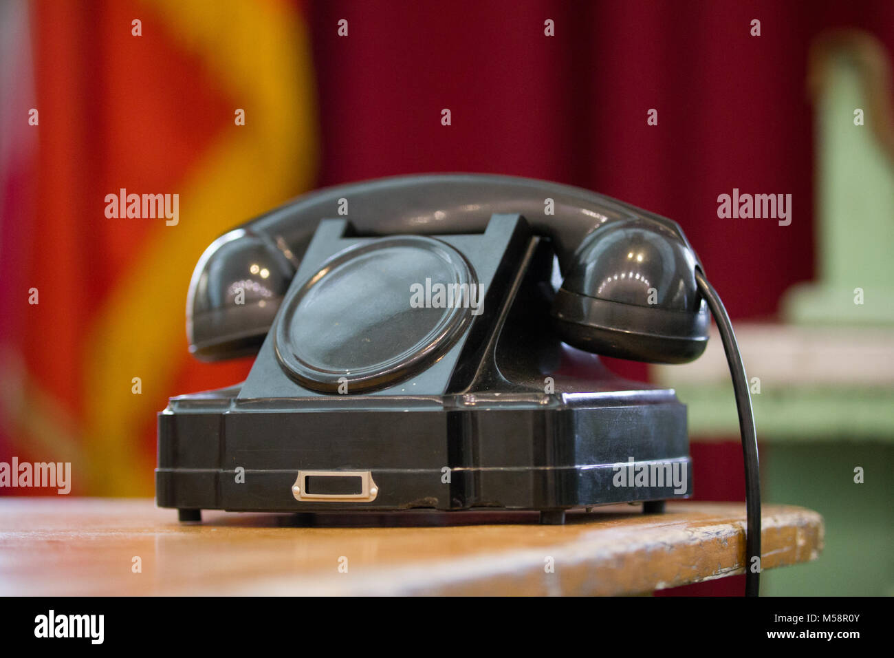 Vintage telephone on old table Stock Photo - Alamy