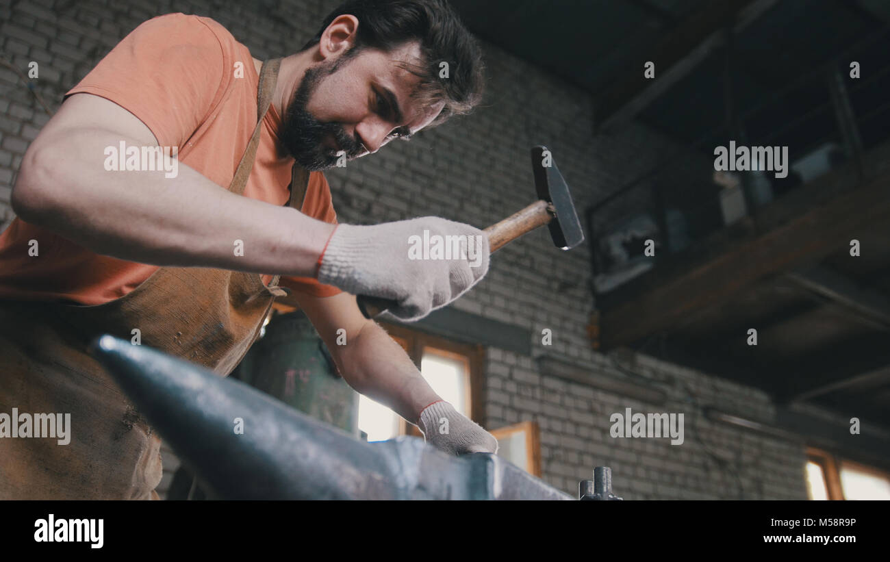 Muscular Blacksmith In Forge Hammering Steel Products Stock Photo Alamy