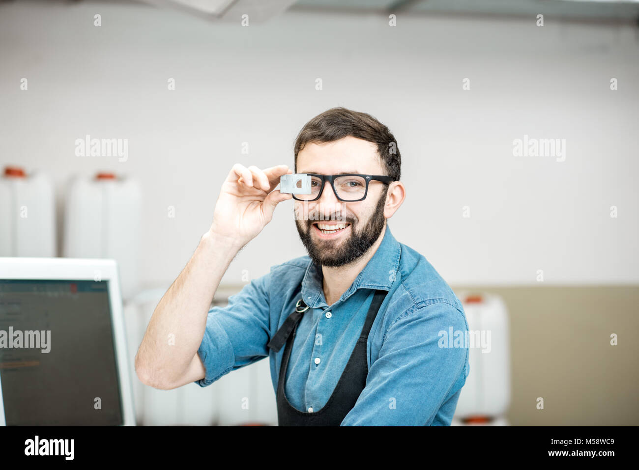 Portrait of a male worker at the printing manufacturing Stock Photo - Alamy