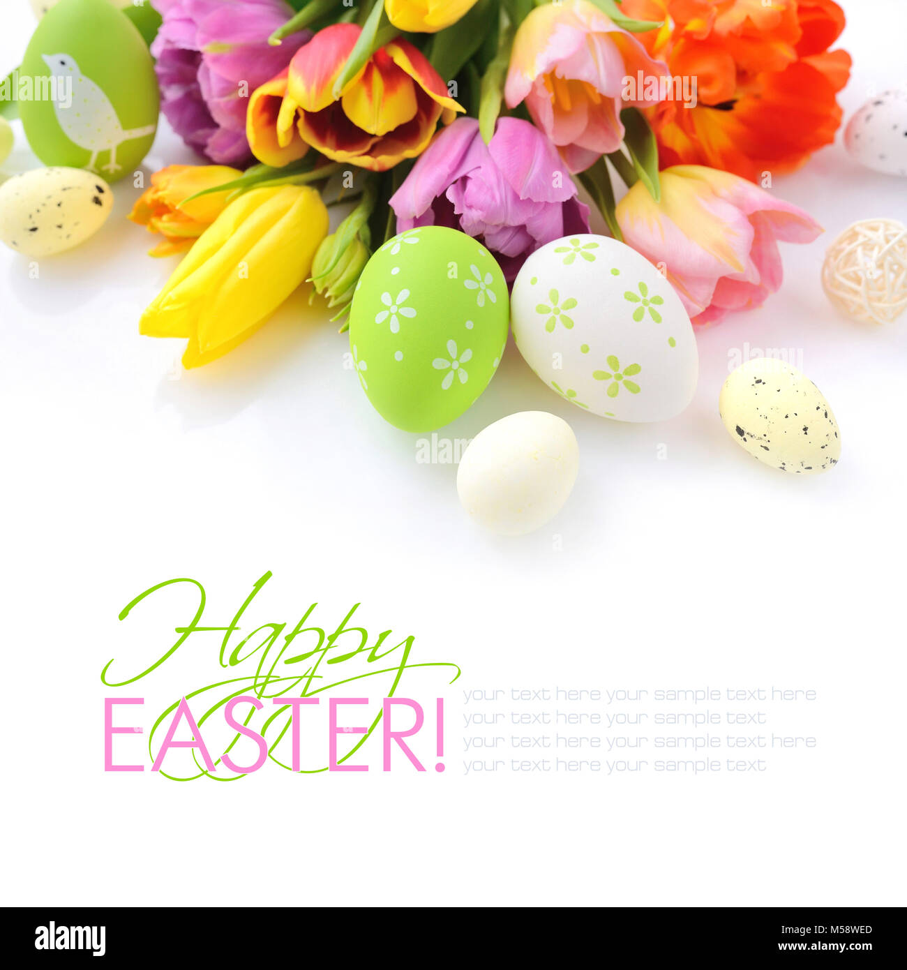 Easter eggs with tulips flowers on white background Stock Photo - Alamy