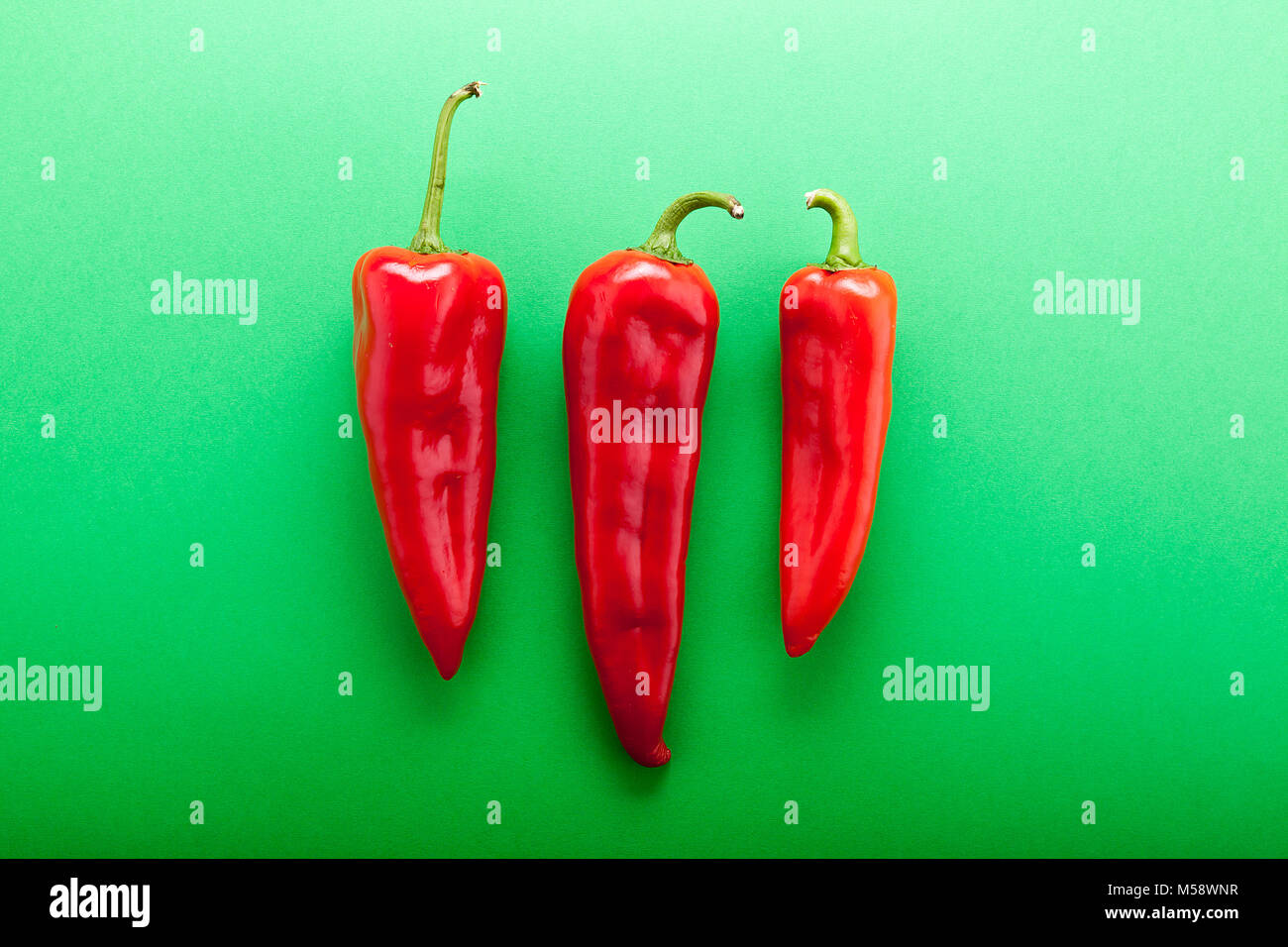 Top view of vegetables on green background Stock Photo - Alamy