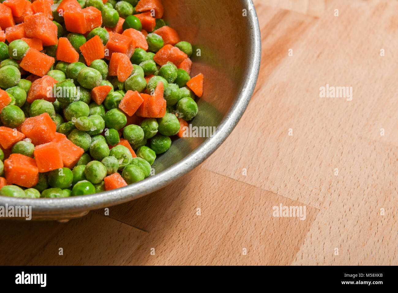 frozen peas and carrots Stock Photo Alamy