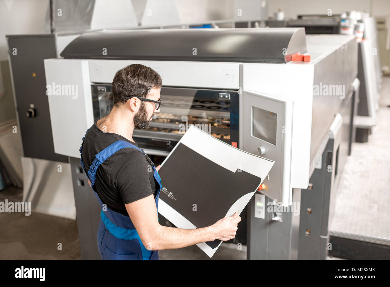 Checking printing quality at the printing plant Stock Photo