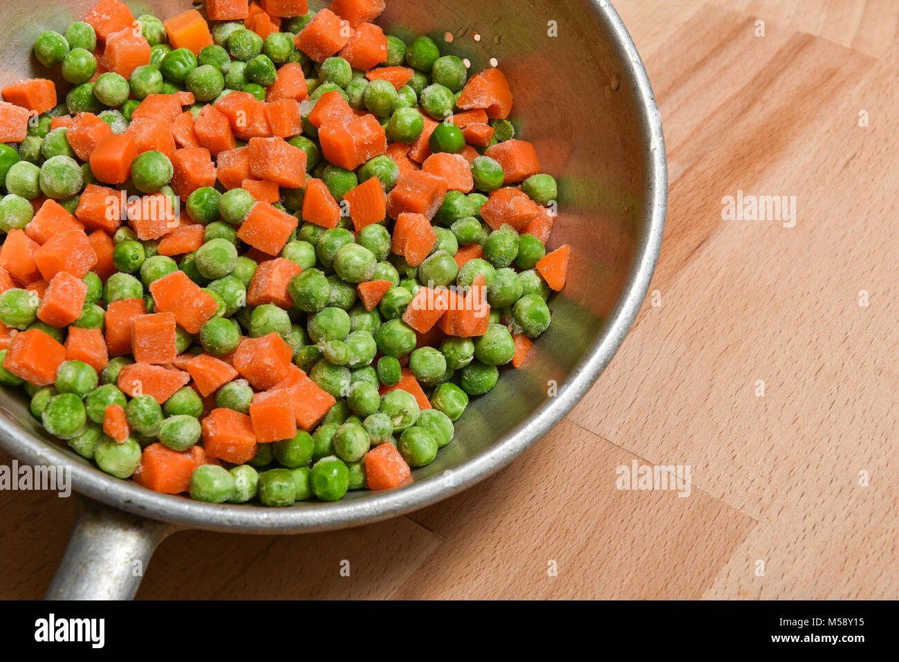 frozen peas and carrots Stock Photo Alamy