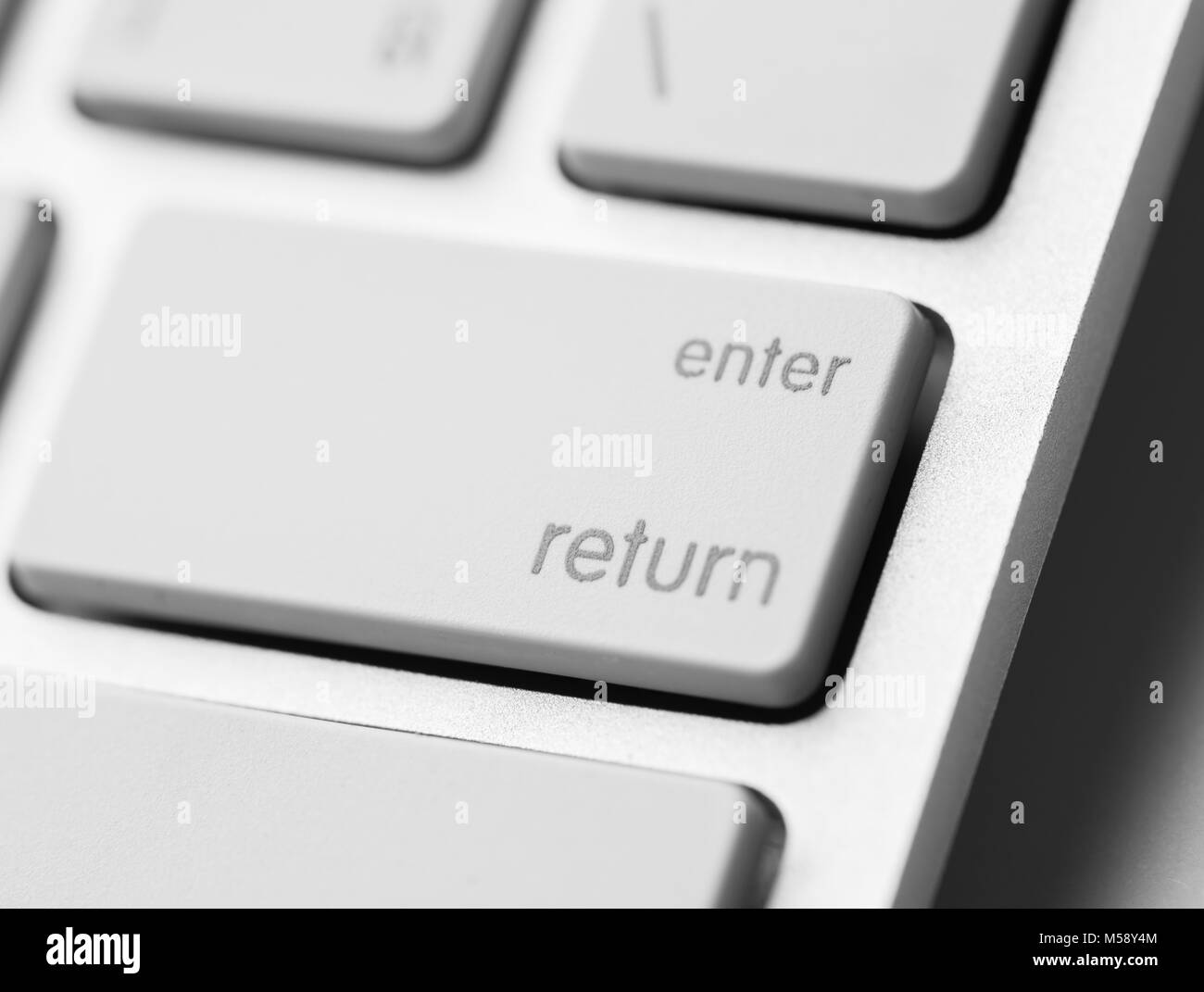 White keyboard enter key Stock Photo Alamy