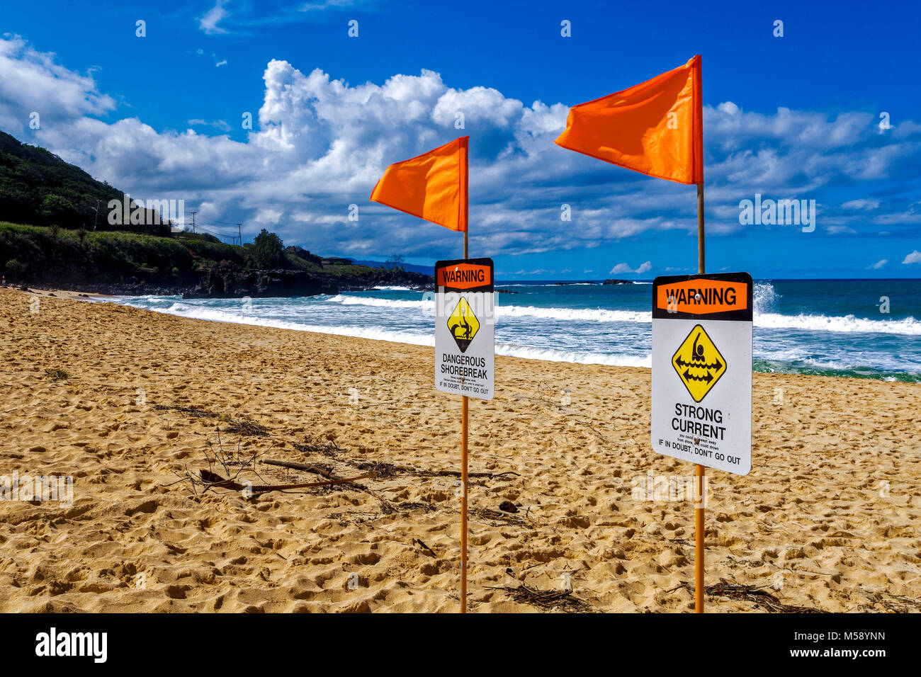 Hawaii warning signs on the beach Stock Photo