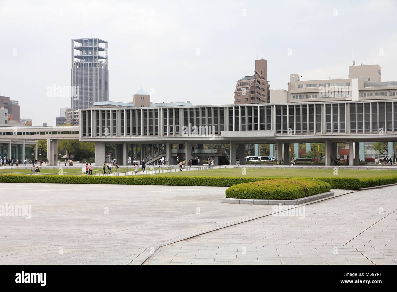 HIROSHIMA, JAPAN - APRIL 21, 2012: People visit Peace Memorial Museum in Hiroshima, Japan. It educates people about the infamous atomic bombing and wa Stock Photo