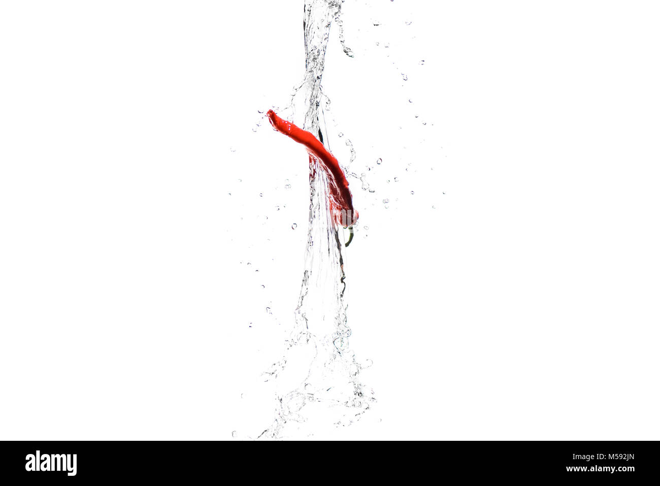 red hot chilli pepper in water splashes isolated on white Stock Photo Alamy