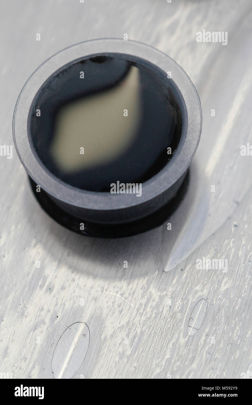 black ink used to tattoo Stock Photo Alamy