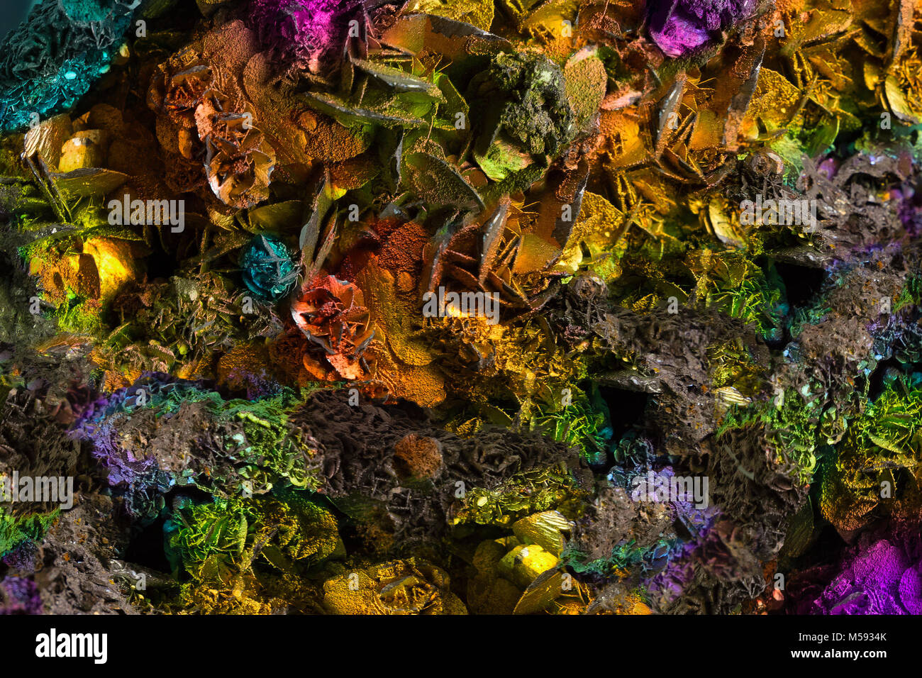 multicolored rock creates a graphic background. Stock Photo