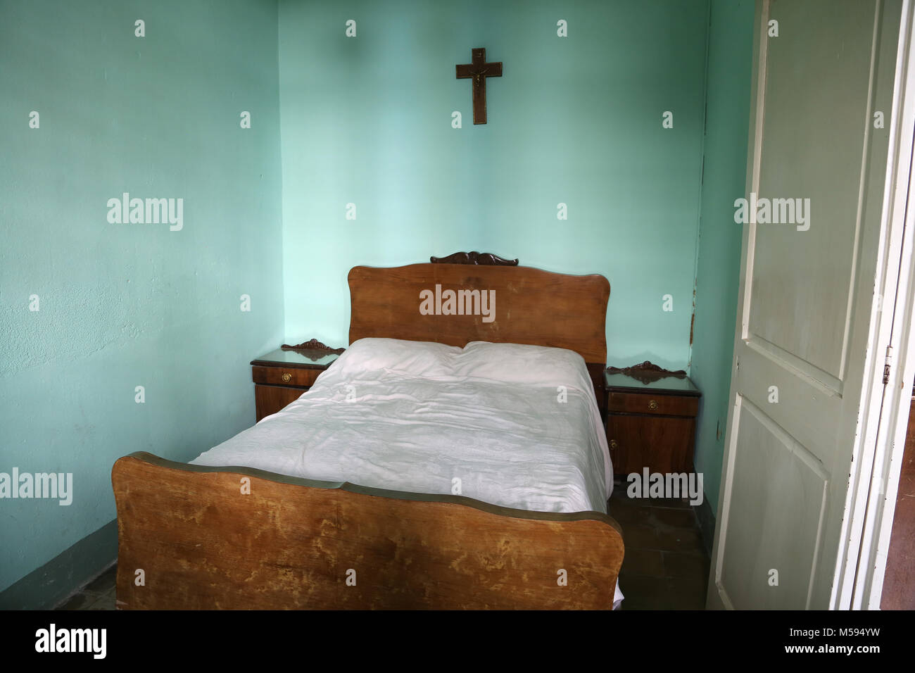 Spain, Catalonia, Puig-Reig. Can Vidal. Textile Industrial colony. 1901-1980. Housing of the workers. Bed. Stock Photo