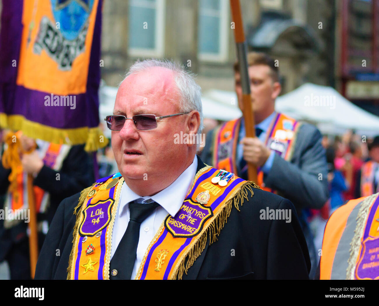 Male member of The Orange Order during the procession up the Royal Mile