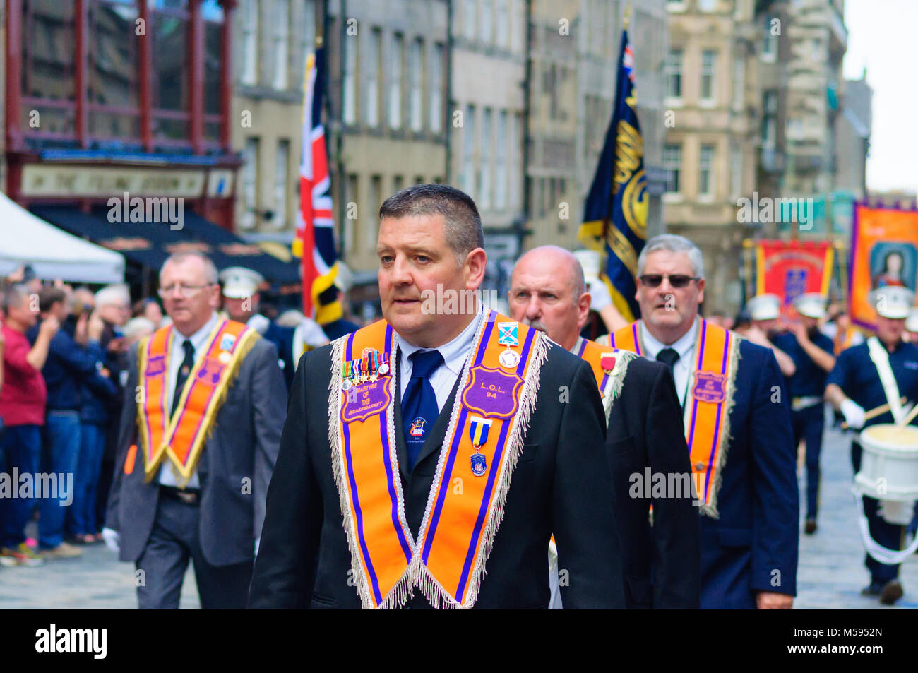 Male member of The Orange Order during the procession up the Royal Mile
