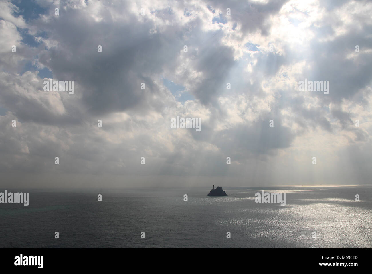 Tea Kettle Island with sunlight break through the clouds at Taejongdae