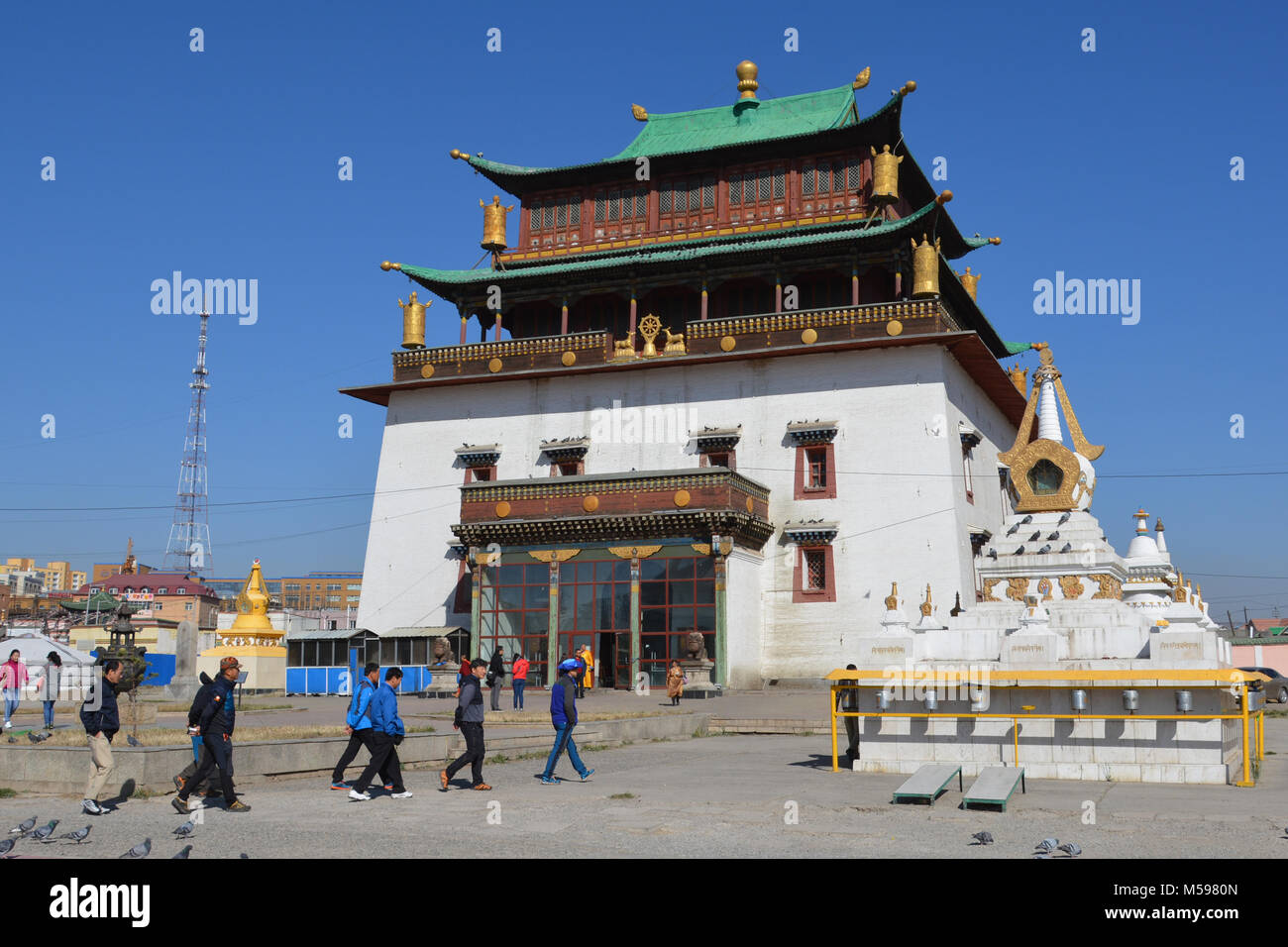 Janraisig Datsan Gandan Gandantegchenling Buddhist monastery Ulaanbaatar, Mongolia on a clear sunny day with clear blue sky. Stock Photo