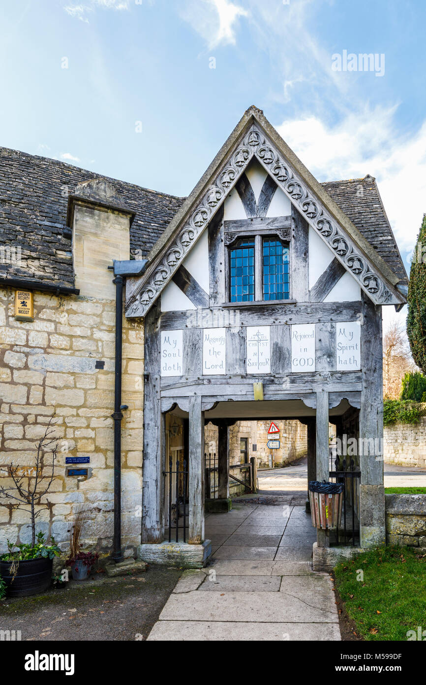 The iconic timbered Lych Gate entrance to the churchyard of St Mary's Parish church in Painswick, an unspoilt village in the Gloucestershire Cotswolds Stock Photo