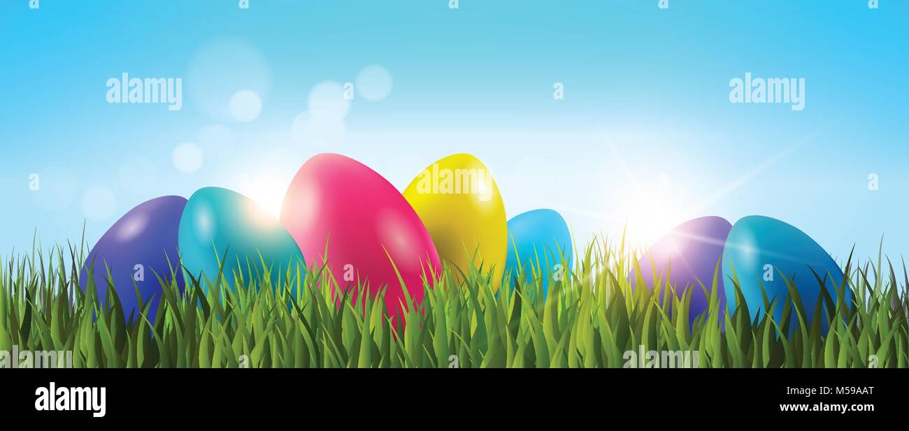 Easter Background With Colorful Eggs In Green Grass Over Blue Sky ...