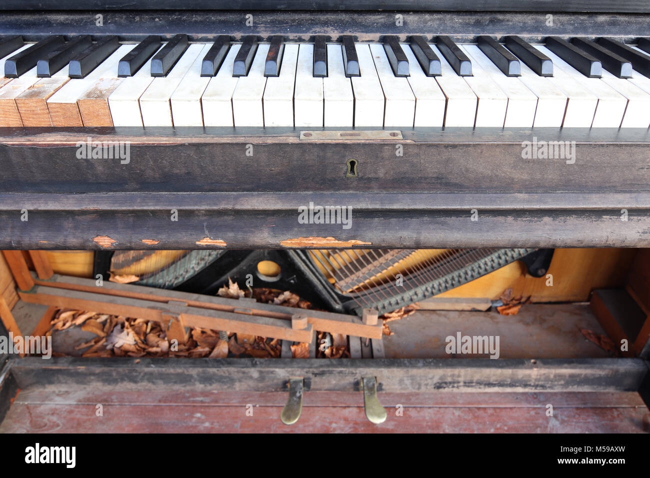 Old, broken and abandoned piano Stock Photo Alamy