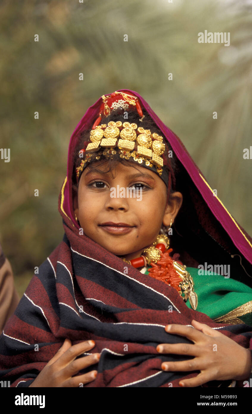 Libya. Ghadames oasis. Sahara desert. Local Berber girl dressed to assist wedding of family. Portrait. Stock Photo