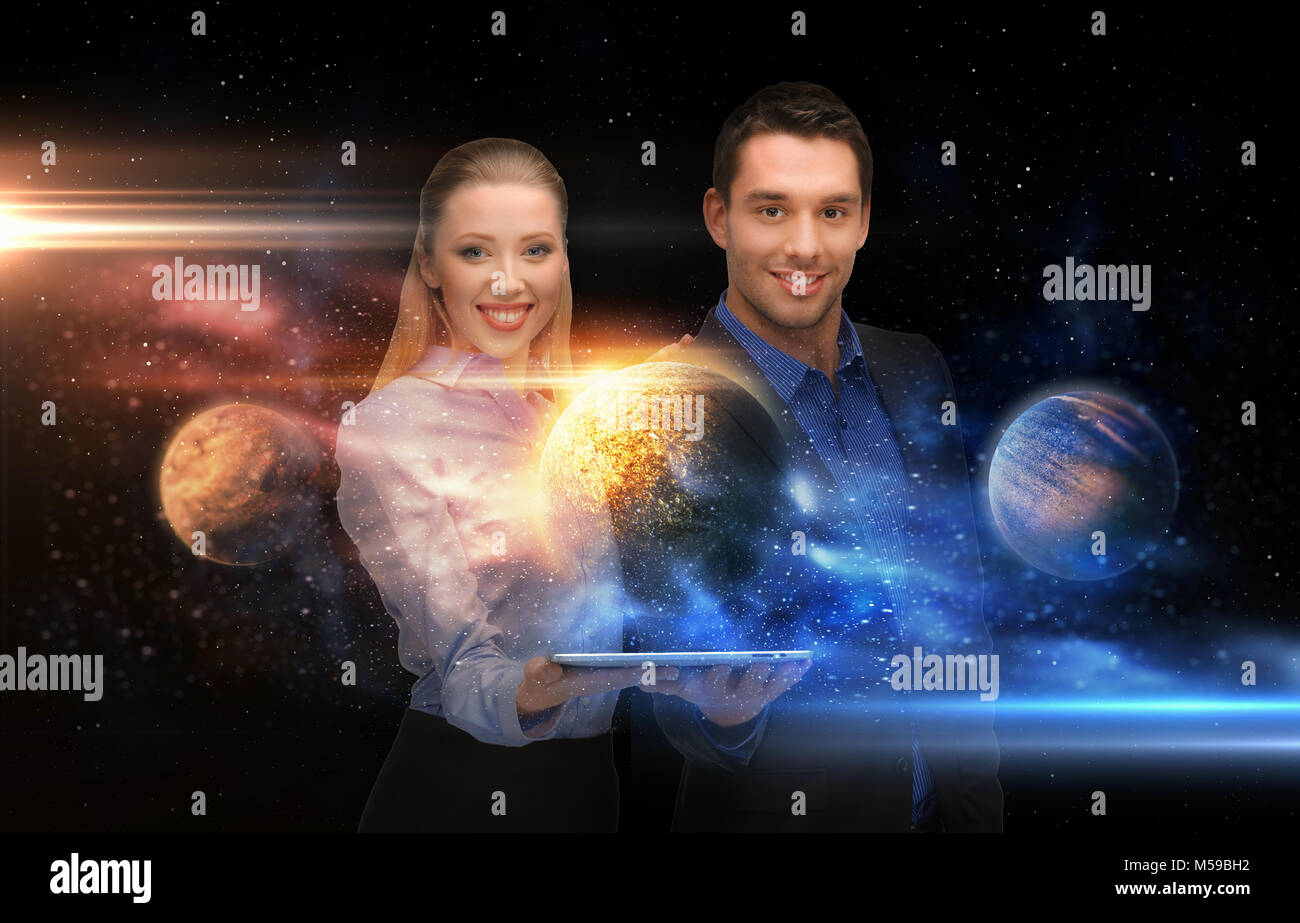 businesspeople with tablet pc and planets in space Stock Photo