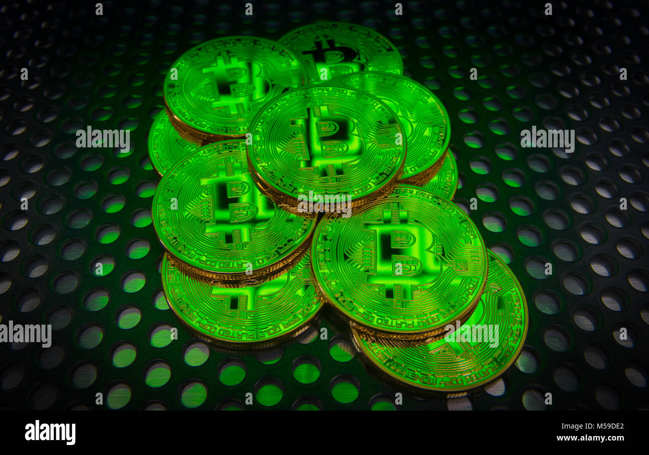 Montreal,Canada,21 February,2018.Stack of bitcoins on a metalic surface.Credit:Mario Beauregard/Alamy Live News Stock Photo