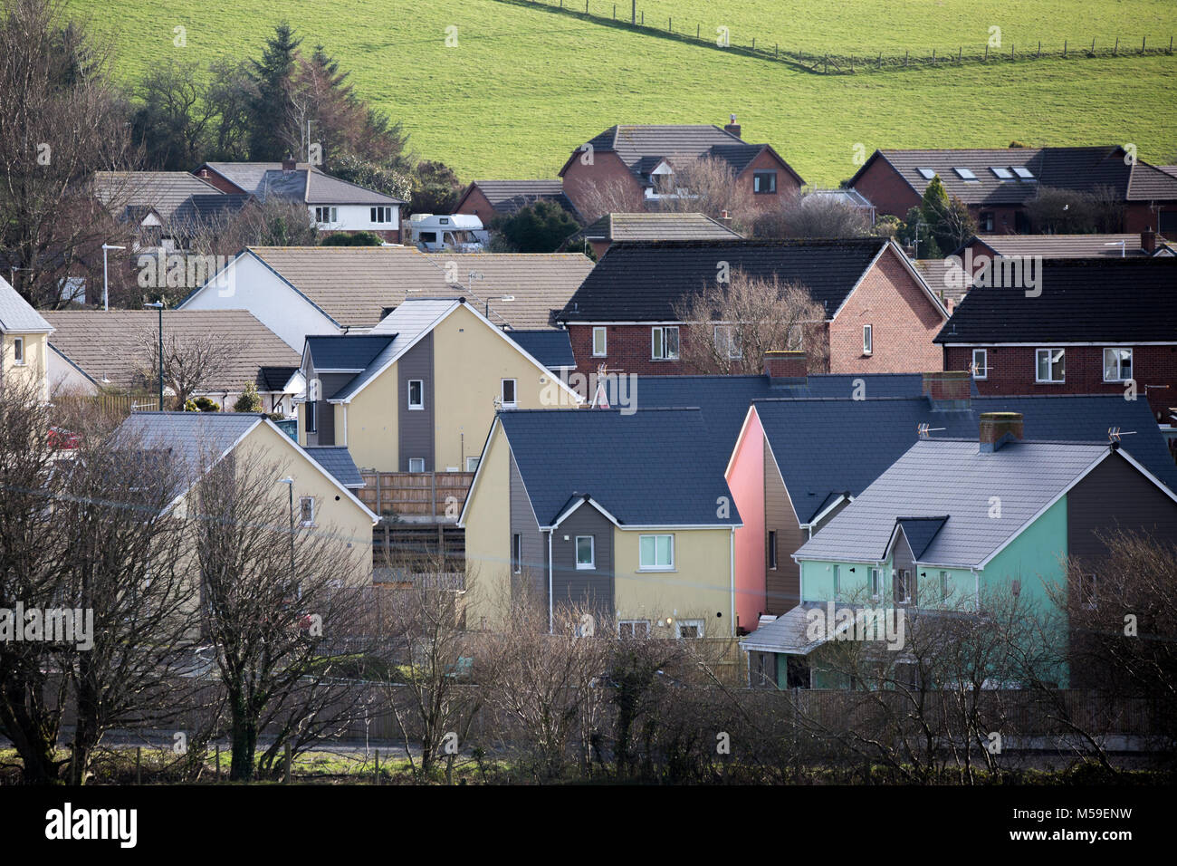A colourful social housing estate built next to older properties in Bow