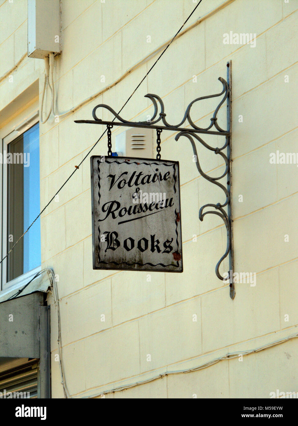 Voltaire and Rousseau book shop sign 12-14 Otago Ln, Glasgow G12 8PB Stock Photo