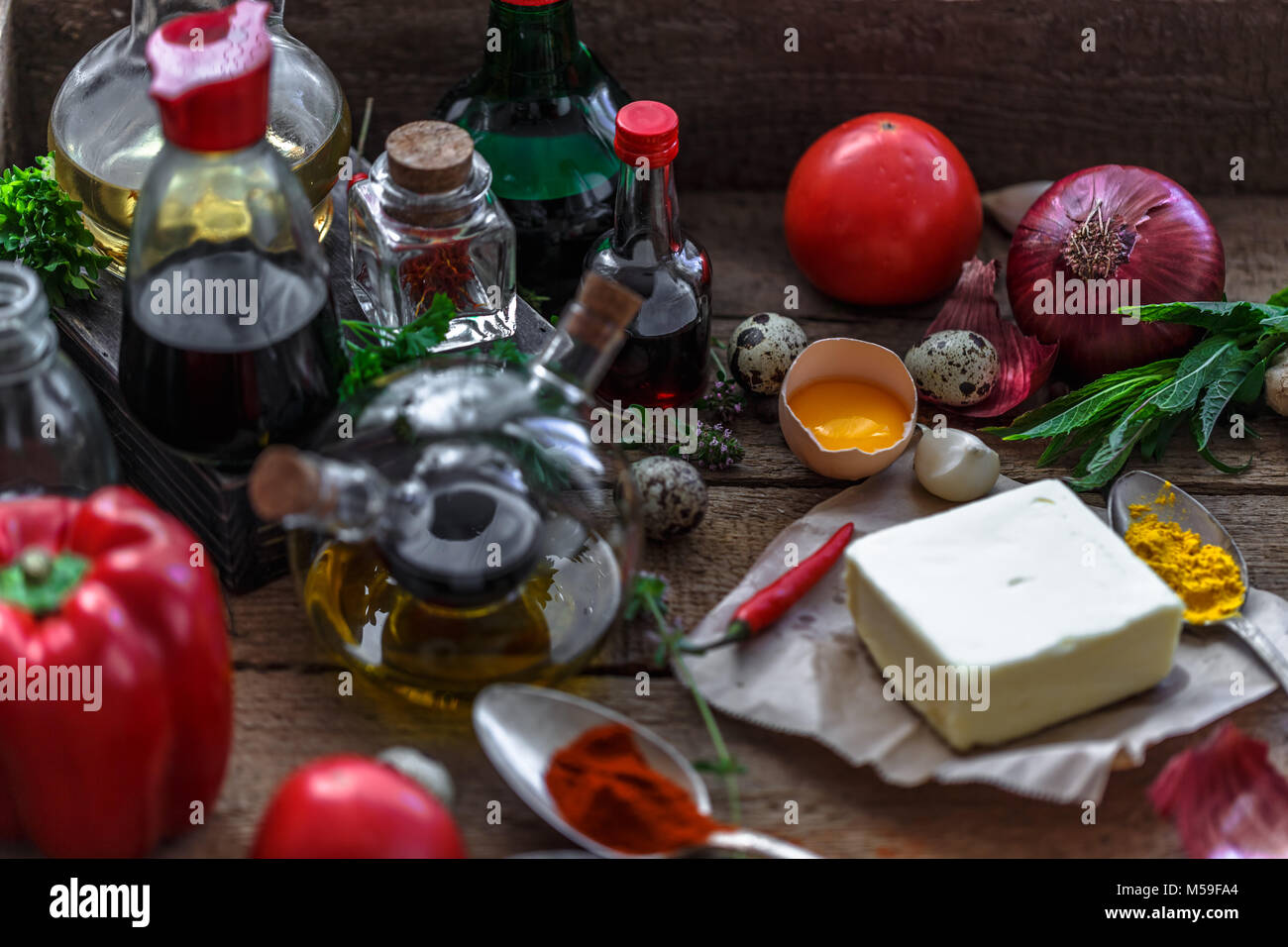 Various ingredients for cooking oils, sauces, spices and vegetables in