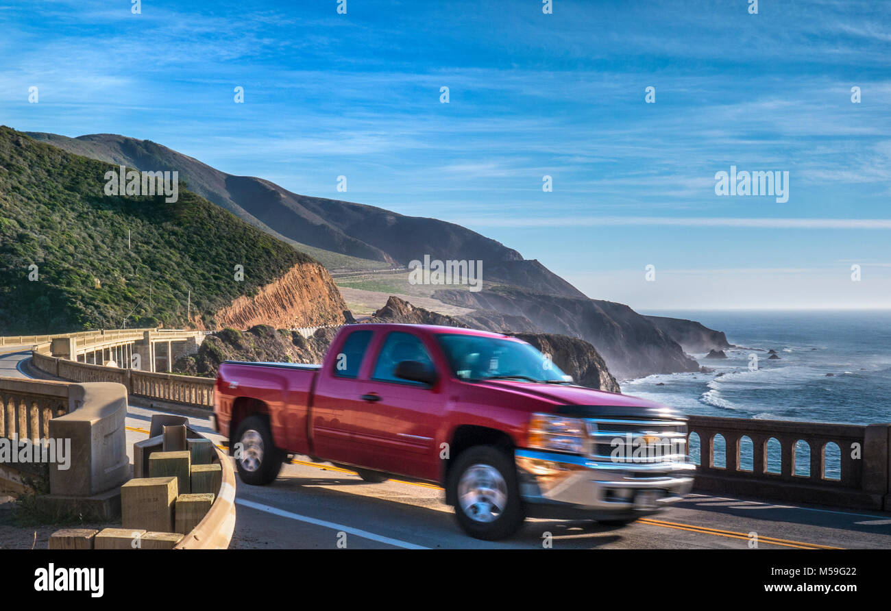 AMERICA WORKING AMERICANA WORKFORCE VEHICLE Red Chevrolet pick-up truck on Bixby Bridge Highway One Big Sur Monterey County California USA Stock Photo