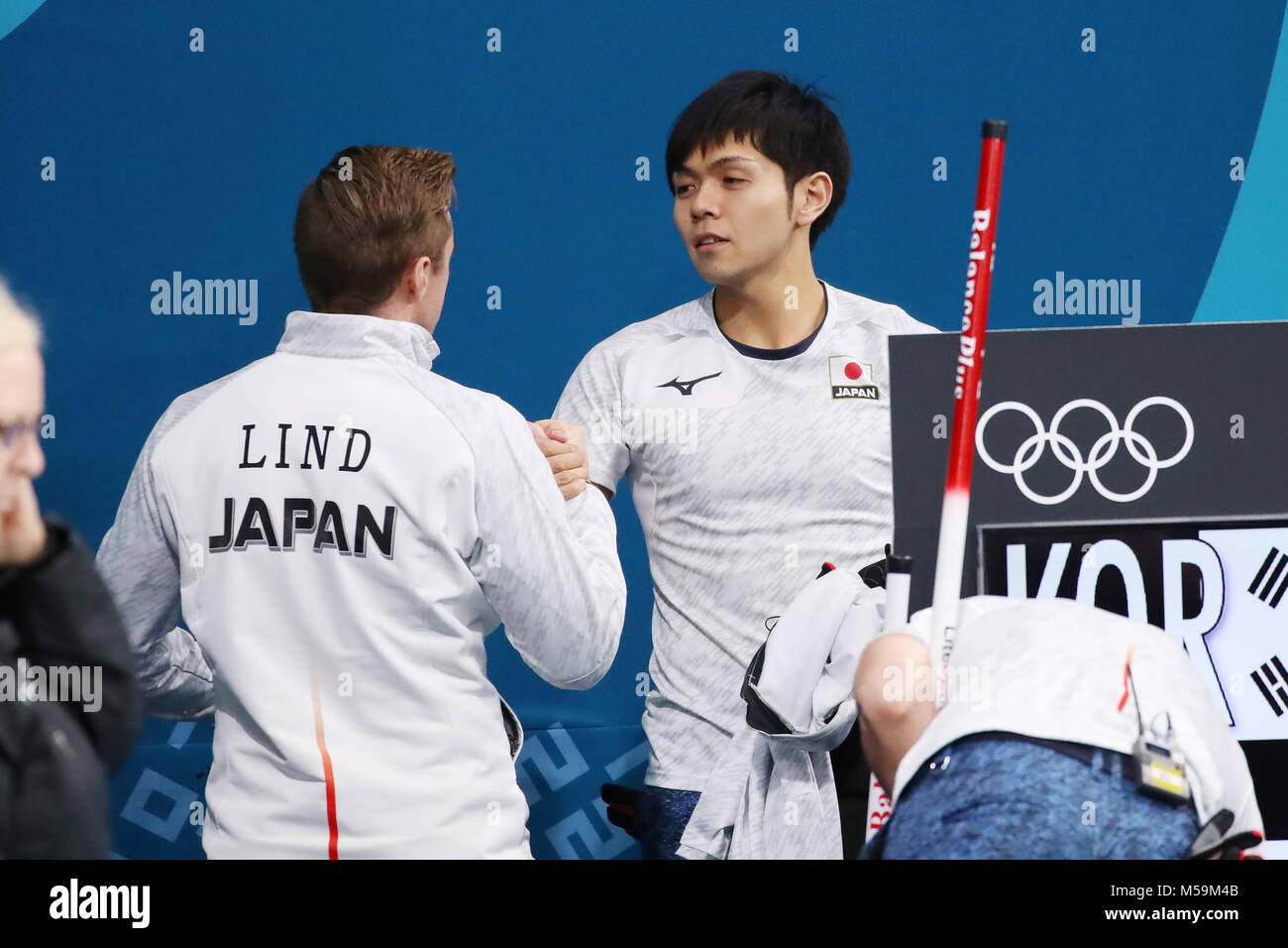 Pyeongchang, Korea. 21st February, 2018. Gangneung, South Korea. 21st Feb, 2018. (L to R) James Lind, Yusuke Morozumi (JPN) Curling : Men's Round Robin match between South Korea - Japan at Gangneung Curling Centre during the PyeongChang 2018 Olympic Winter Games in Gangneung, South Korea . Credit: YUTAKA/AFLO SPORT/Alamy Live News Stock Photo