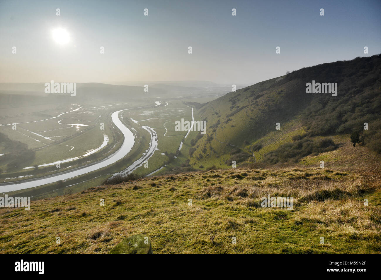 Seaford, East Sussex, UK. 21st February 2018. Morning mist in the South Downs National Park near Seaford, East Sussex, as temperatures drop again. Credit:  Peter Cripps/Alamy Live News Stock Photo