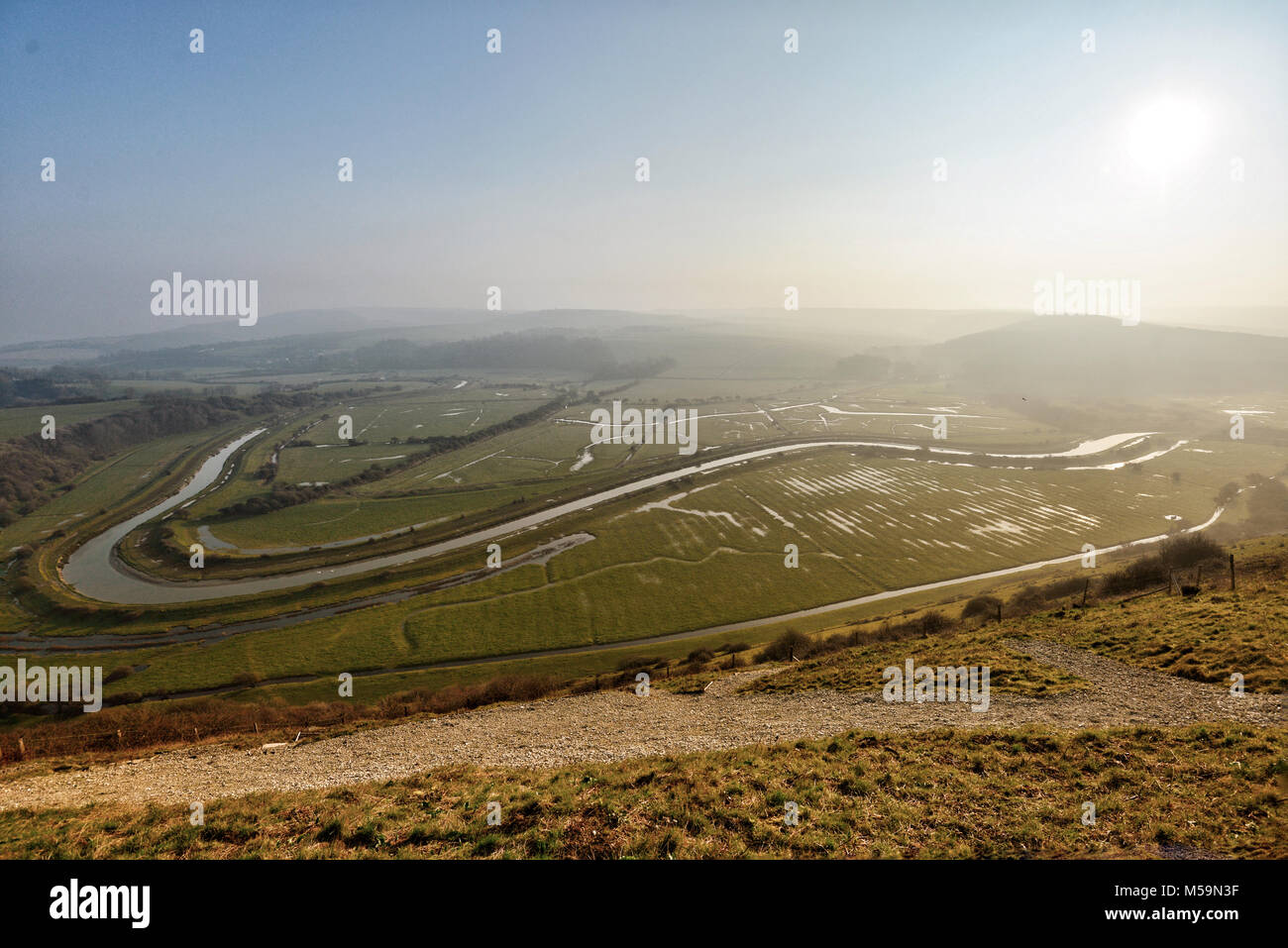 Seaford, East Sussex, UK. 21st February 2018. Morning mist in the South Downs National Park near Seaford, East Sussex, as temperatures drop again. Credit:  Peter Cripps/Alamy Live News Stock Photo