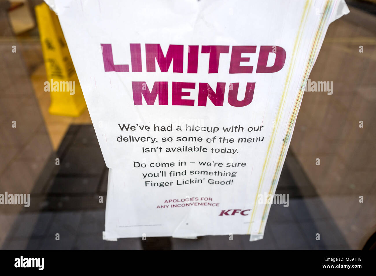 Brighton, UK. 21st February, 2018. The KFC branch in Brighton's Western Road displaying signs explaining the company's current difficulties Credit: Andrew Hasson/Alamy Live News Stock Photo
