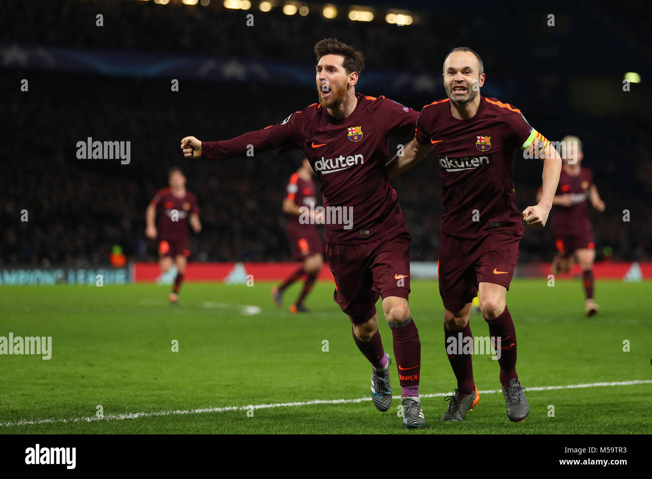 London, UK. 20th February, 2018. Lionel Messi (left) of Barcelona celebrates with Andres Iniesta after scoring the equalising goal, making it 1-1- Chelsea v Barcelona, UEFA Champions League, Round of 16, 1st Leg, Stamford Bridge, London - 20th February 2018. Credit: Richard Calver/Alamy Live News Stock Photo