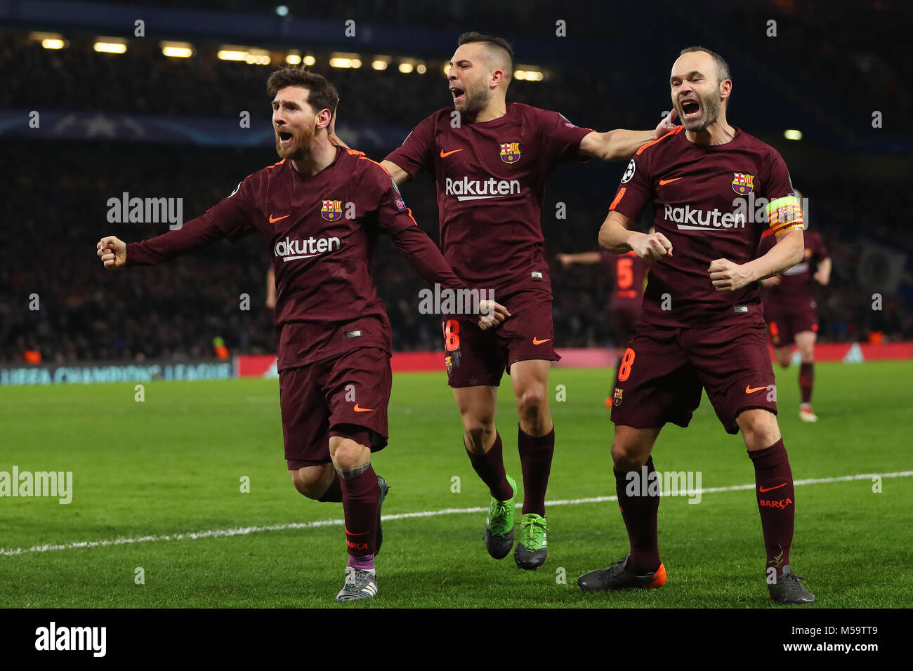 London, UK. 20th February, 2018. Lionel Messi (left) of Barcelona celebrates with Jordi Alba (centre) and Andres Iniesta (right) after scoring the equalising goal, making it 1-1- Chelsea v Barcelona, UEFA Champions League, Round of 16, 1st Leg, Stamford Bridge, London - 20th February 2018. Credit: Richard Calver/Alamy Live News Stock Photo