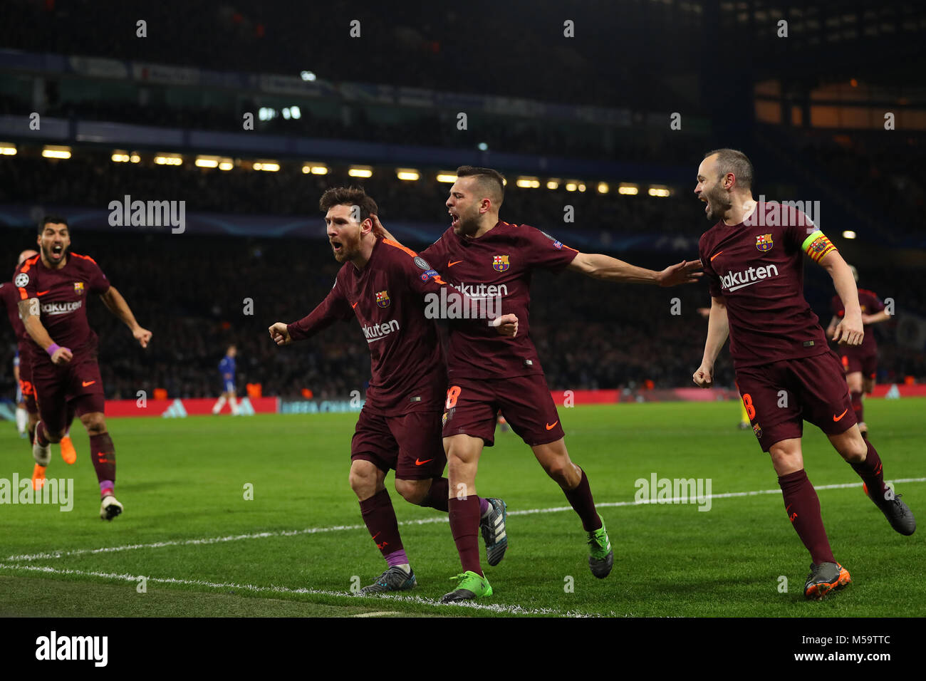 London, UK. 20th February, 2018. Lionel Messi of Barcelona celebrates with Jordi Alba and Andres Iniesta (right) after scoring the equalising goal, making it 1-1- Chelsea v Barcelona, UEFA Champions League, Round of 16, 1st Leg, Stamford Bridge, London - 20th February 2018. Credit: Richard Calver/Alamy Live News Stock Photo