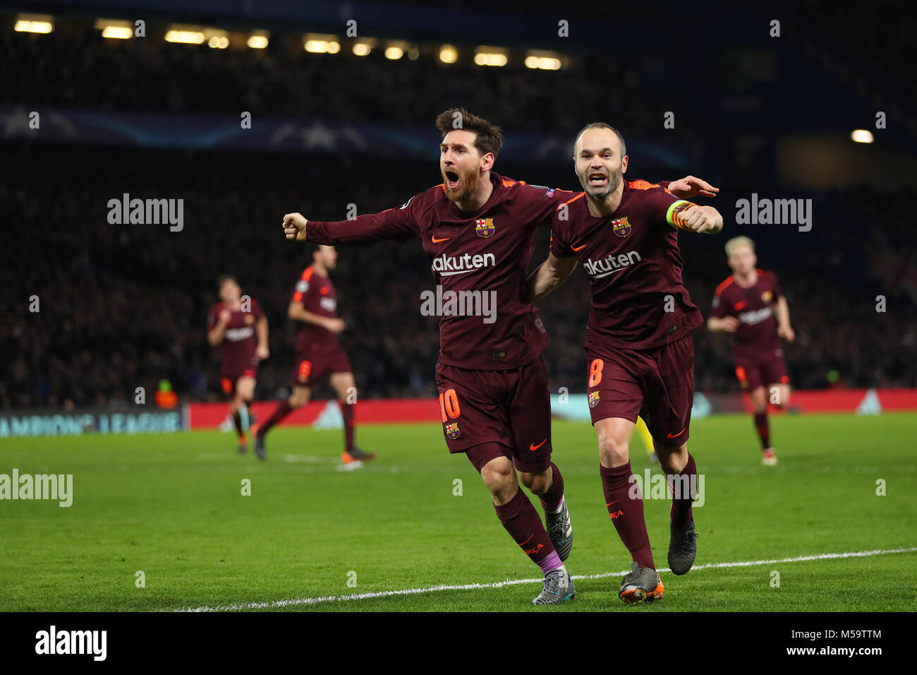 London, UK. 20th February, 2018. Lionel Messi (left) of Barcelona celebrates with Andres Iniesta after scoring the equalising goal, making it 1-1- Chelsea v Barcelona, UEFA Champions League, Round of 16, 1st Leg, Stamford Bridge, London - 20th February 2018. Credit: Richard Calver/Alamy Live News Stock Photo