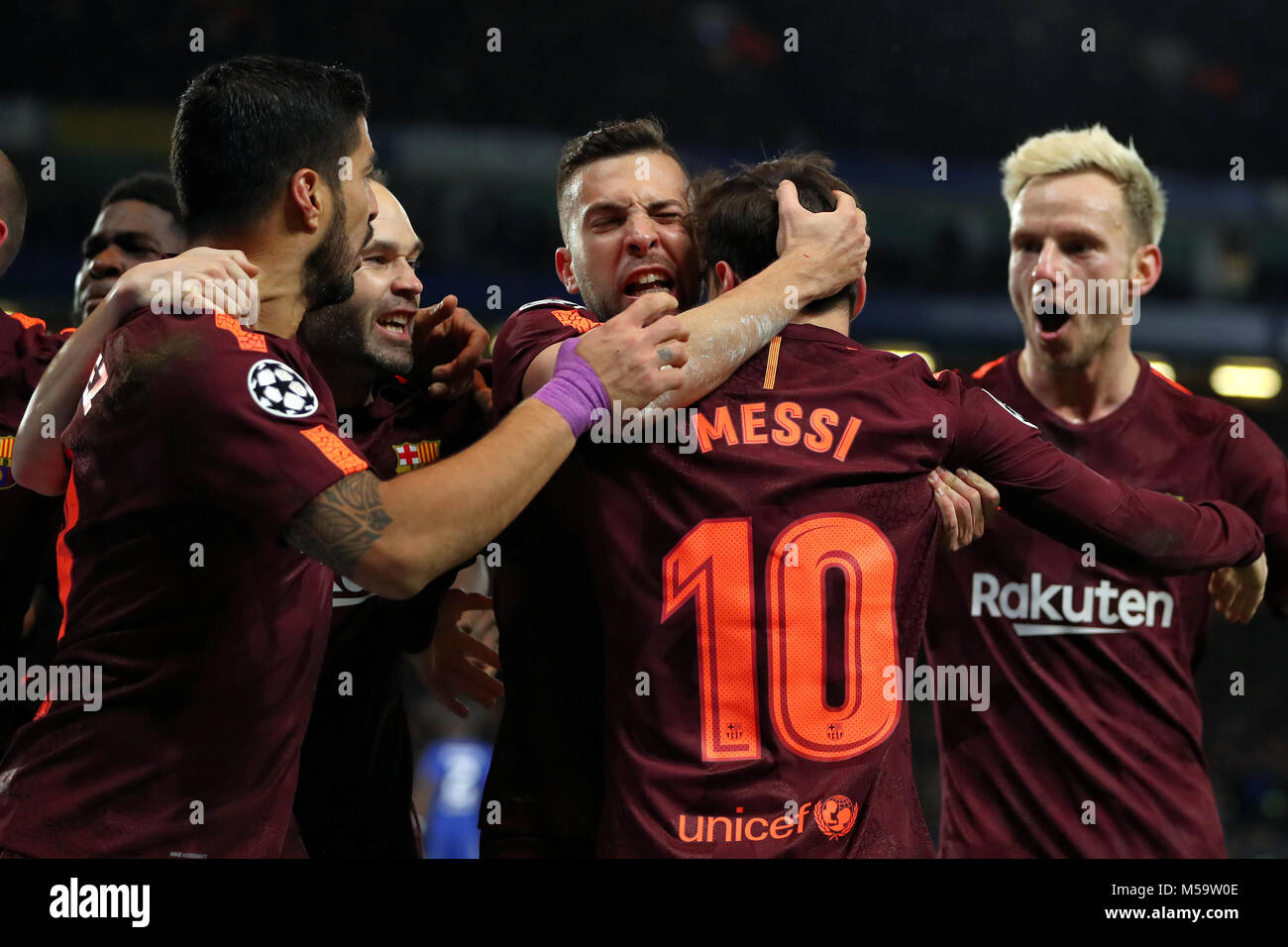 London, UK. 20th February, 2018. Lionel Messi of Barcelona is congratulated after scoring the equalising goal, making it 1-1 - Chelsea v Barcelona, UEFA Champions League, Round of 16, 1st Leg, Stamford Bridge, London - 20th February 2018. Credit: Richard Calver/Alamy Live News Stock Photo
