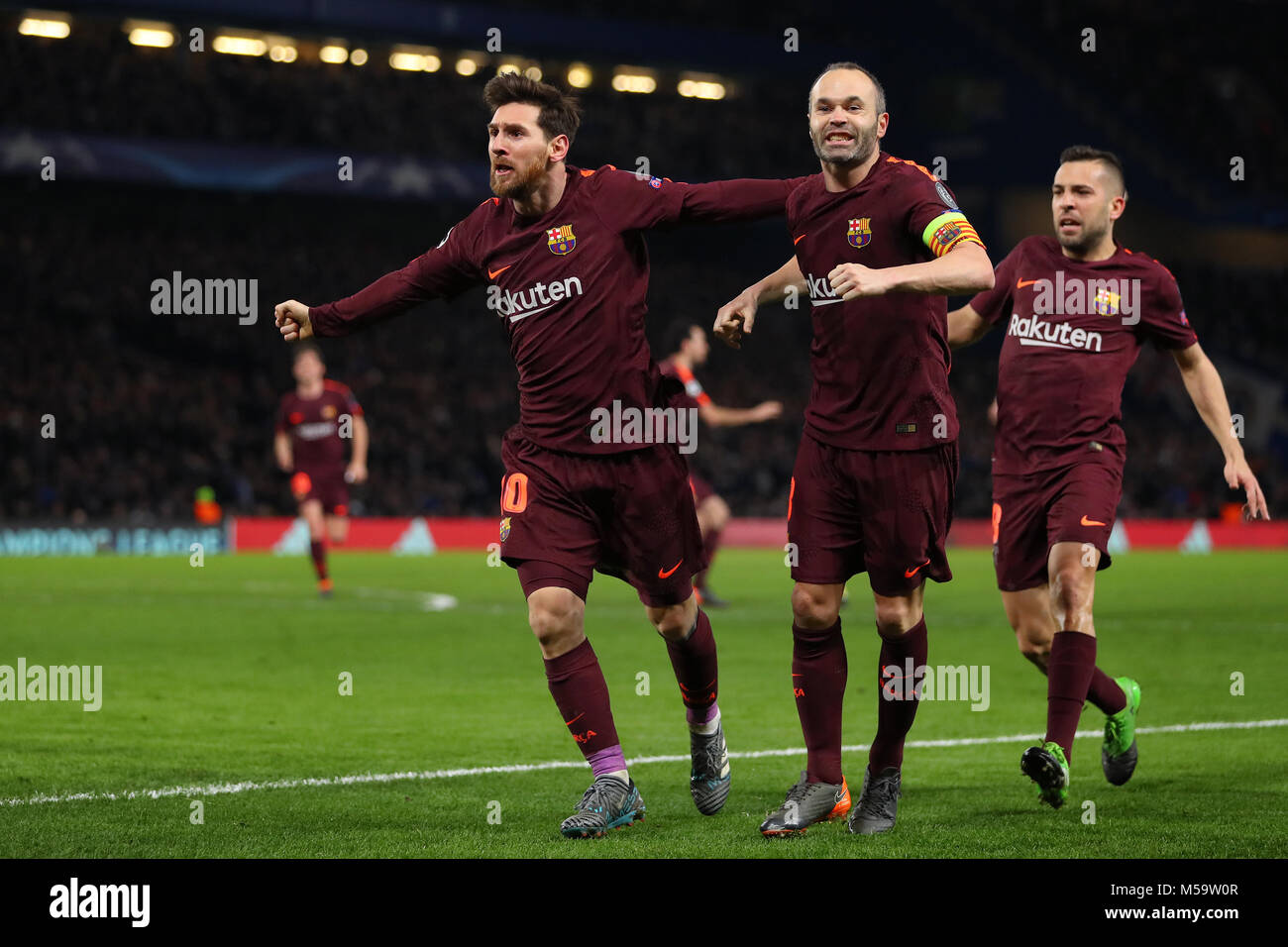 London, UK. 20th February, 2018. Lionel Messi (left) of Barcelona celebrates with Andres Iniesta (centre) and Jordi Alba (right) after scoring the equalising goal, making it 1-1- Chelsea v Barcelona, UEFA Champions League, Round of 16, 1st Leg, Stamford Bridge, London - 20th February 2018. Credit: Richard Calver/Alamy Live News Stock Photo