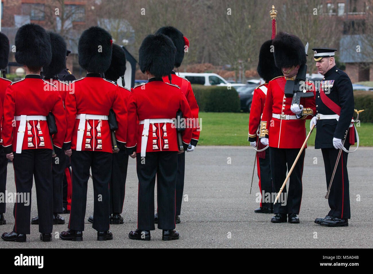 Windsor, UK. 21st February, 2018. Garrison Sergeant Major WO1 Andrew Stokes carries out an annual inspection of the 1st Battalion Coldstream Guards, chosen to Troop its Colour for the Queen’s Birthday Parade on 9th June. Soldiers are tested on military knowledge, history, values and standards and their uniforms, presentation and drill are minutely examined. Credit: Mark Kerrison/Alamy Live News Stock Photo